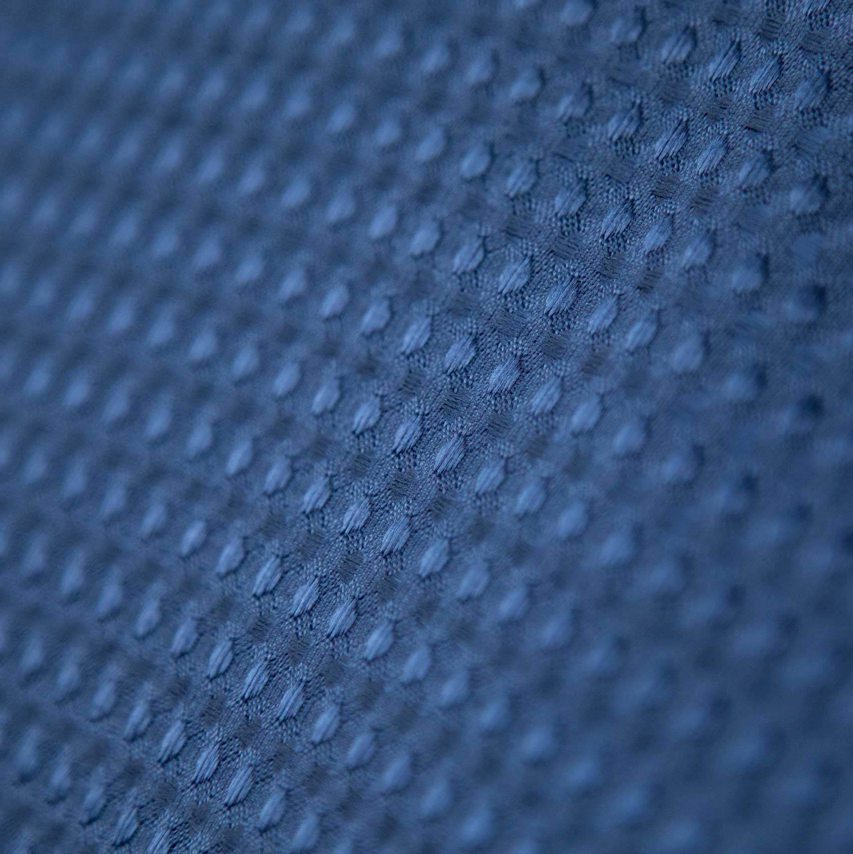 Premier Equine Buster Waffle Horse Cooler Rug Navy - Close-up of breathable, moisture-wicking fabric. Ideal horse apparel.