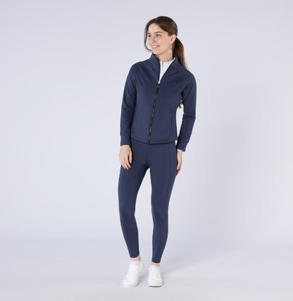 Woman in Navy Thermodry Riding Tights & Jacket | Equestrian Apparel | CAMEO | Winter Riding Clothes