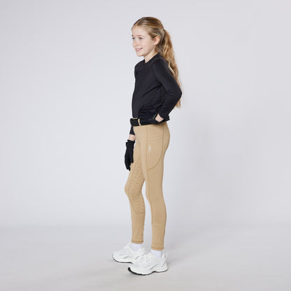 Junior Equestrian in Cameo Riding Tights: Performance, Comfort & Style - Silicone Grip & Phone Pocket. #ridingtights #equestrian #cameo