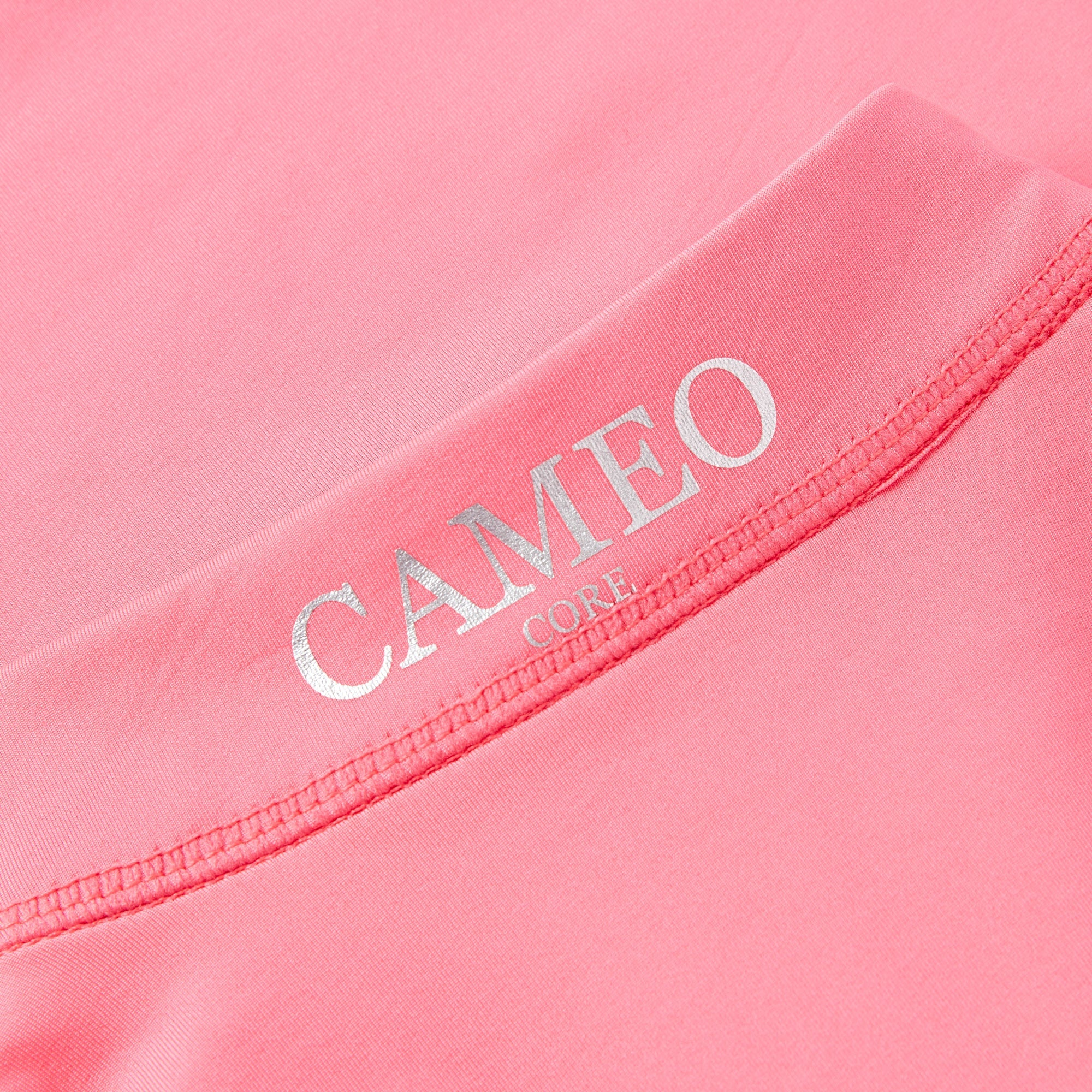 Cameo Core baselayer close-up: Equestrian performance apparel. Silky smooth CameoTech material with stylish tailored fit.
