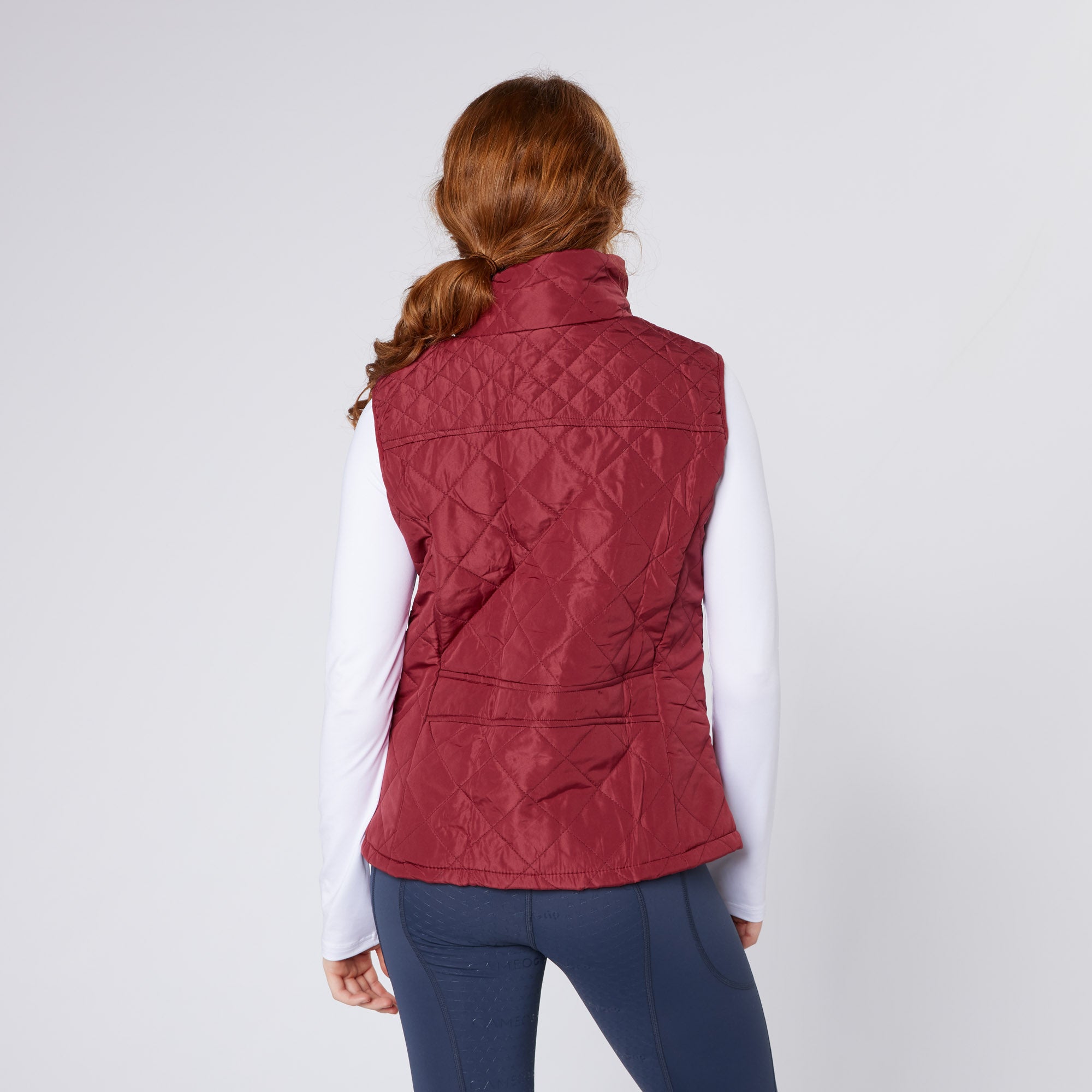 Cameo Equine burgundy quilted gilet vest for women. Equestrian riding apparel.