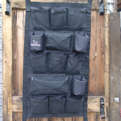 CAMEO Stable Organiser Black: Wall-mounted organizer for horse grooming supplies and accessories.