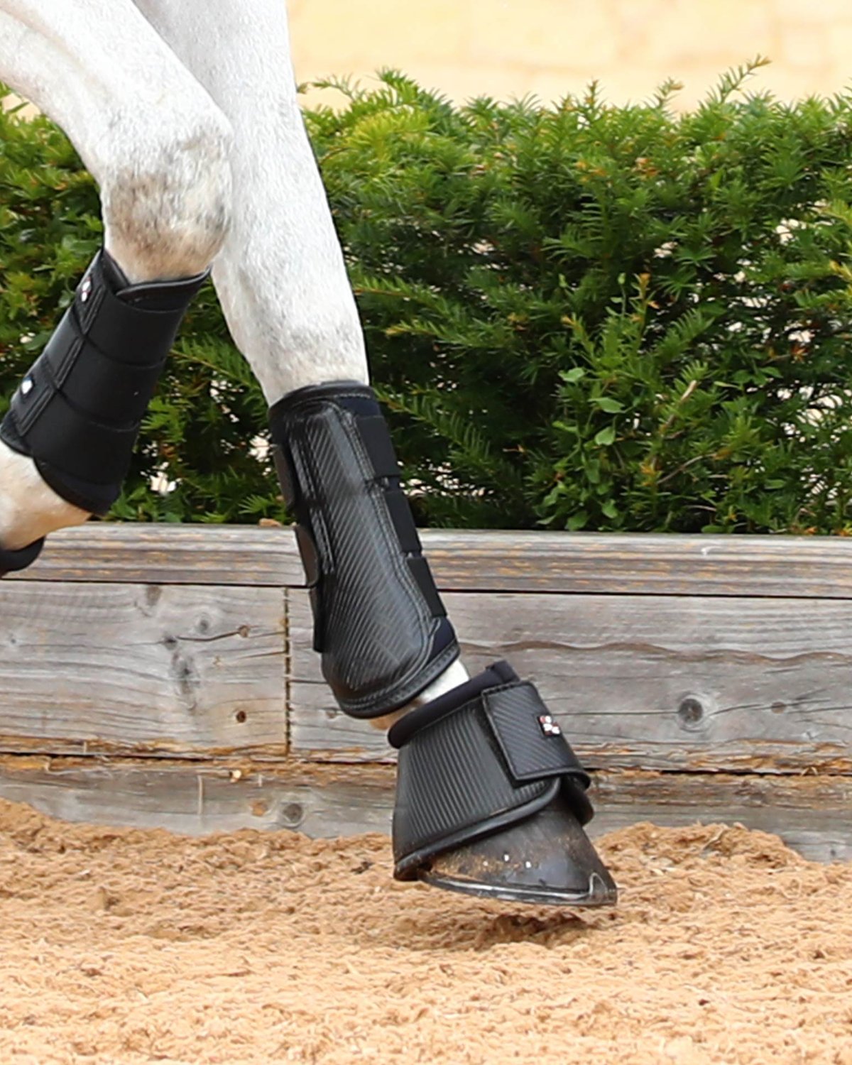 PREMIER EQUINE Carbon Over Reach Boots - Black. Horse hoof protection, carbon fiber style, support, equestrian equipment.