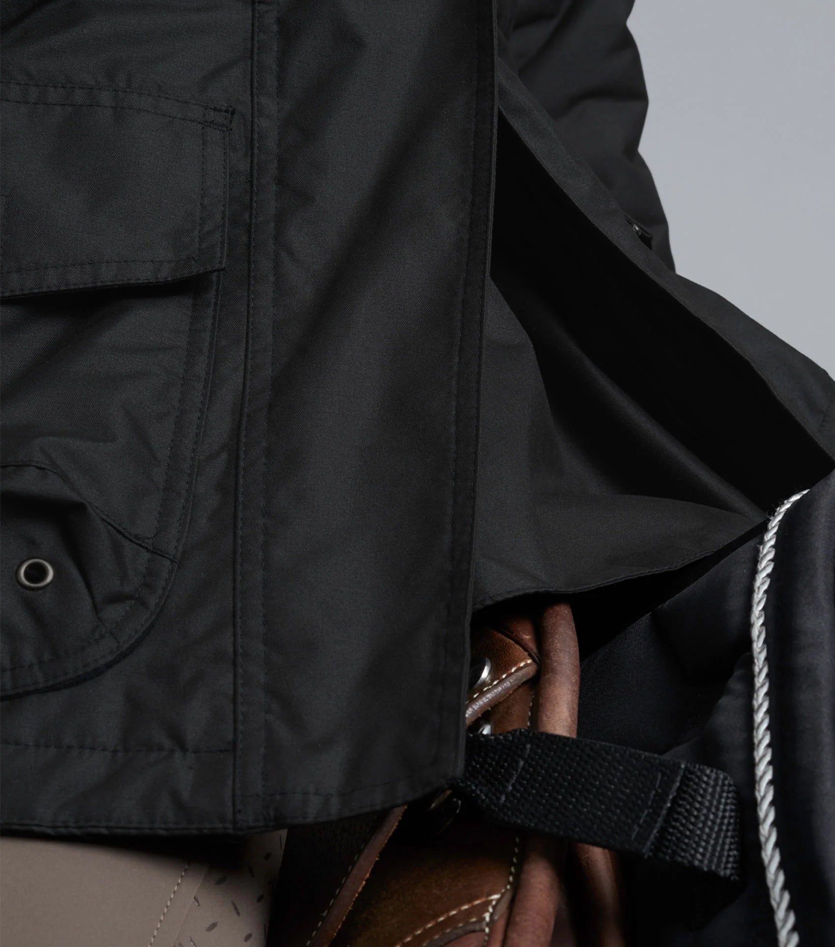 Premier Equine Cascata Ladies Waterproof Riding Coat - Black. Equestrian jacket with hood and pockets.