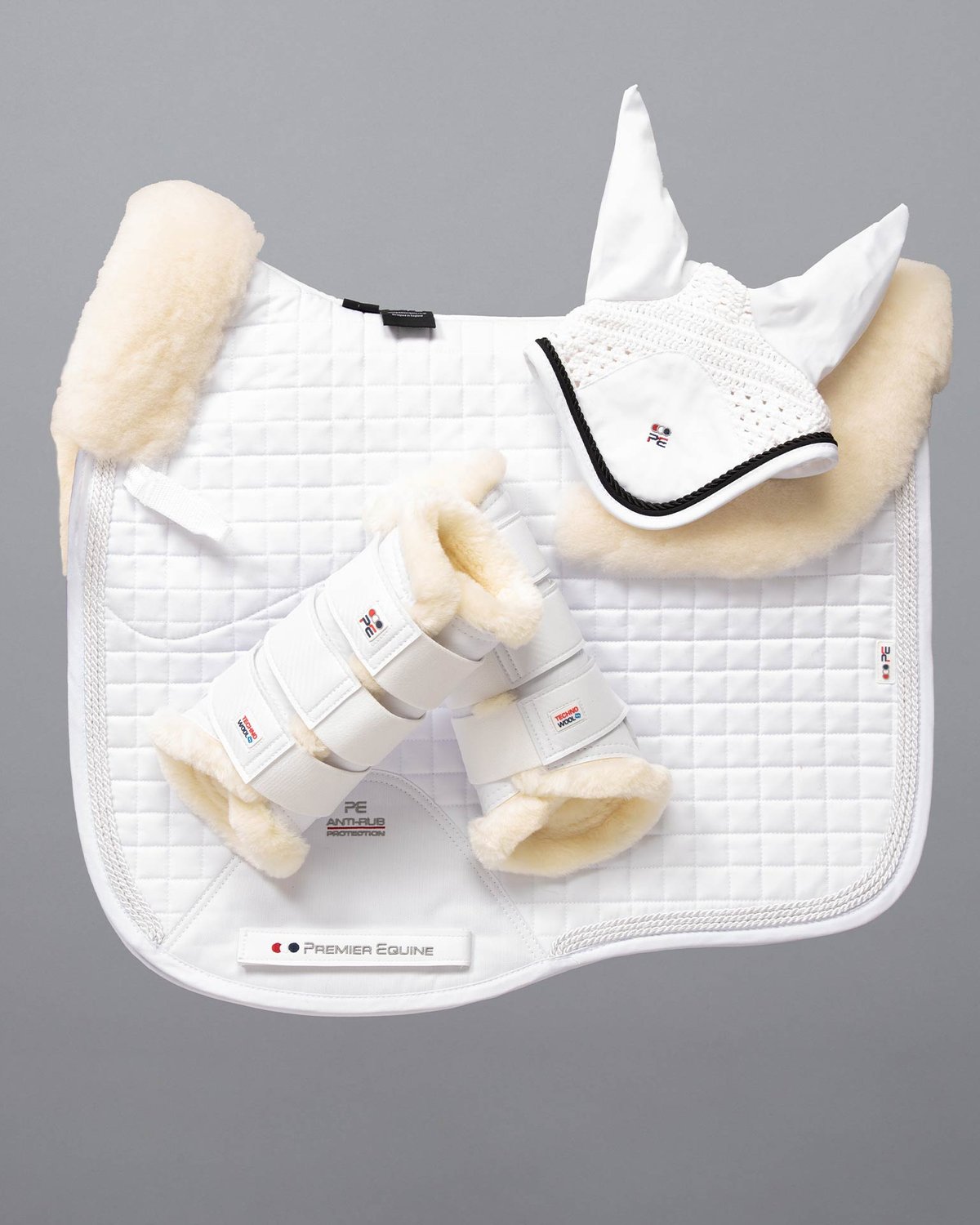 Premier Equine White Merino Wool Dressage Saddle Pad Set: Pad, Ear Bonnet, Boots. Horse Riding Tack for Comfort & Protection. Equiflair