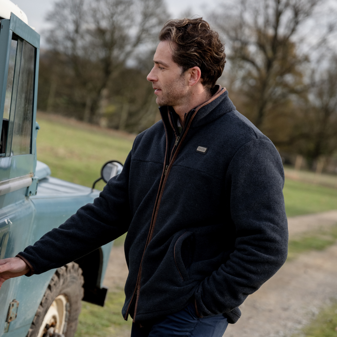 TOGGI Downing men's dark grey melange fleece jacket with faux leather binding and zip pockets