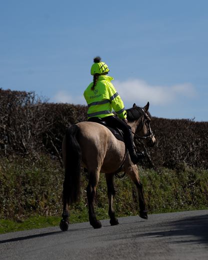 Equidry hi-vis yellow children's riding jacket with reflective details for visibility.