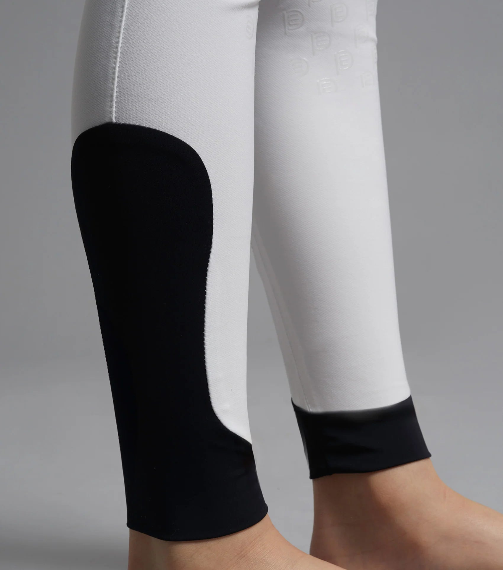 Premier Equine Derby Boys White Competition Riding Breeches with Black Knee Patch & Cuffs. Equestrian Pants for Kids.