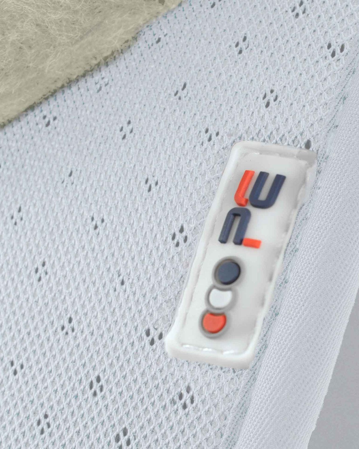 Premier Equine Saddle Pad Detail: Airtechnology Shockproof Material, White Mesh, Brand Tag.