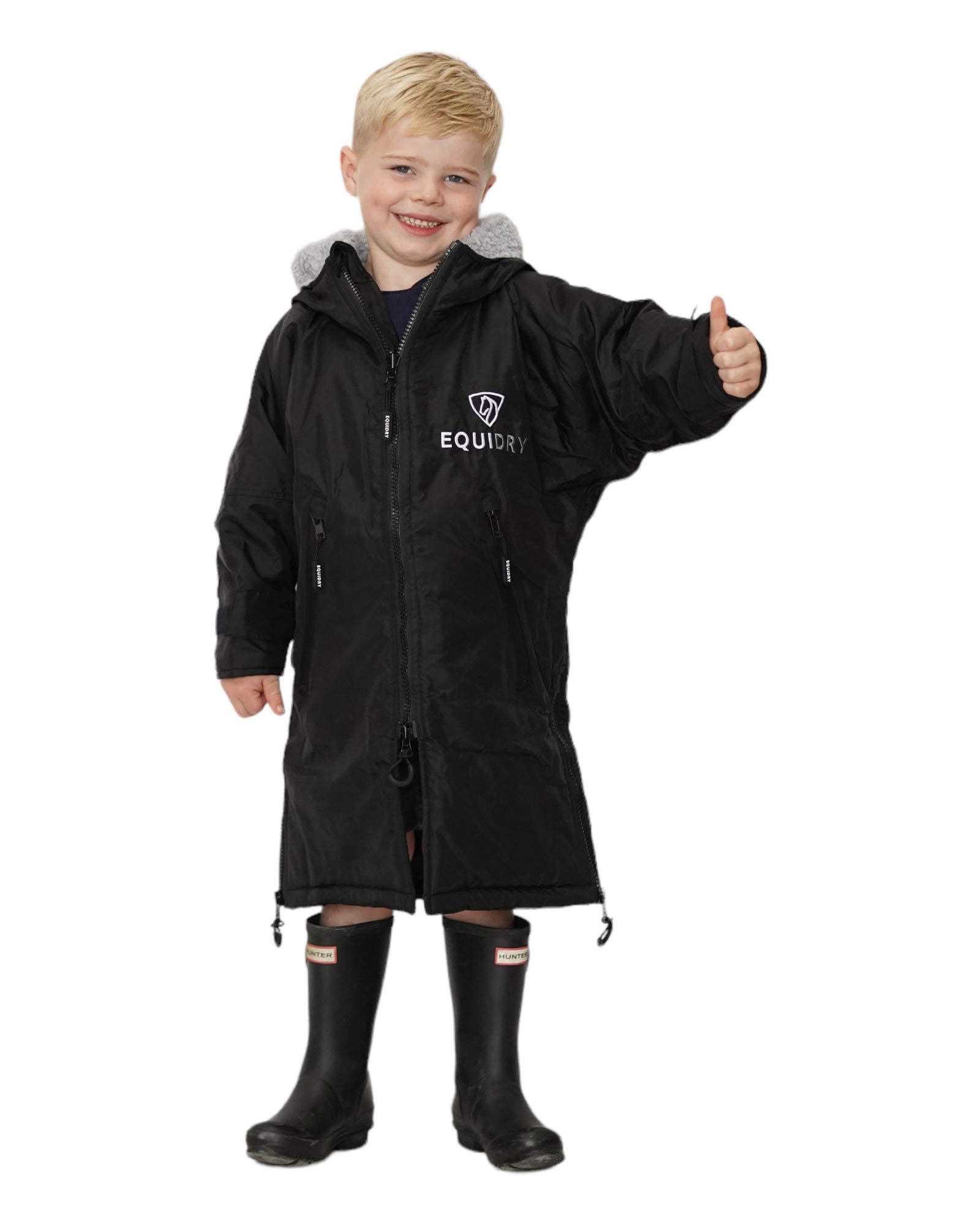 Boy in EQUIDRY Children's Fleece Black Riding Coat with Hood - Waterproof, Windproof, Warm Equestrian Gear