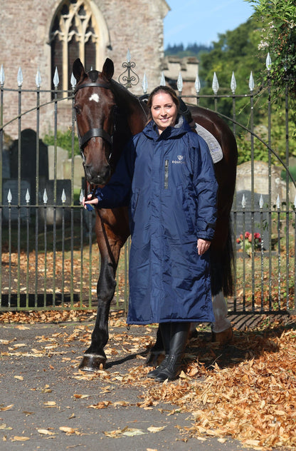 EQUIDRY waterproof horse riding raincoat All Rounder Original thick fleece Women's Navy/Grey rider stood with horse 
