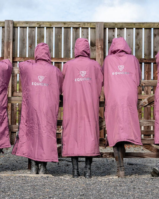 EQUIDRY waterproof horse riding raincoat | All Rounder Original Women's | valerian group shot from behind 