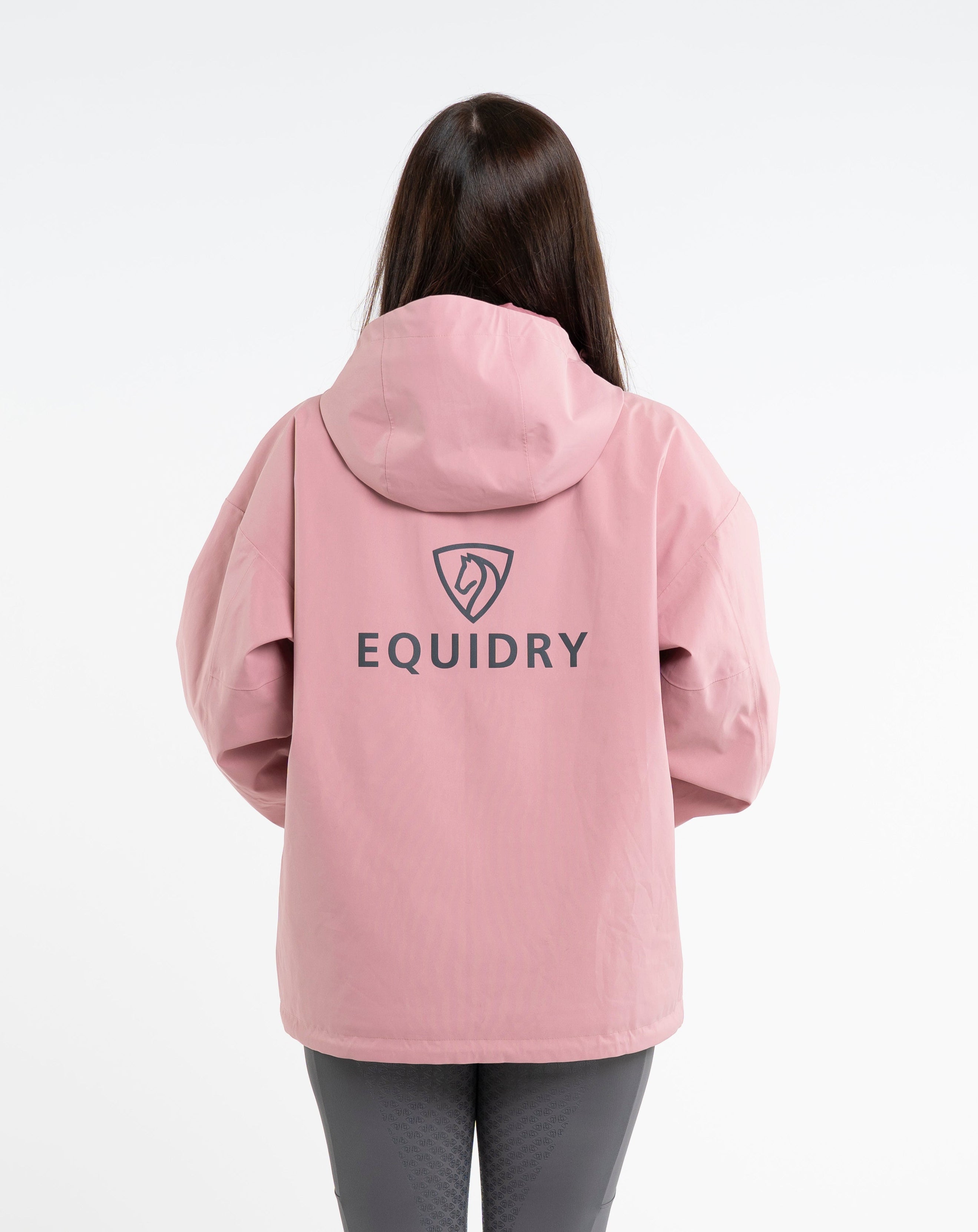 EQUIDRY Women's Storm Smock Pale Pink: Waterproof Riding Hoodie from Equiflair. Casual & Practical Equestrian Outerwear.