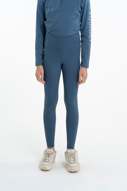 Child in EQUIDRY Steel Blue Riding Leggings: Water-Repellent Knee Grip Equestrian Apparel