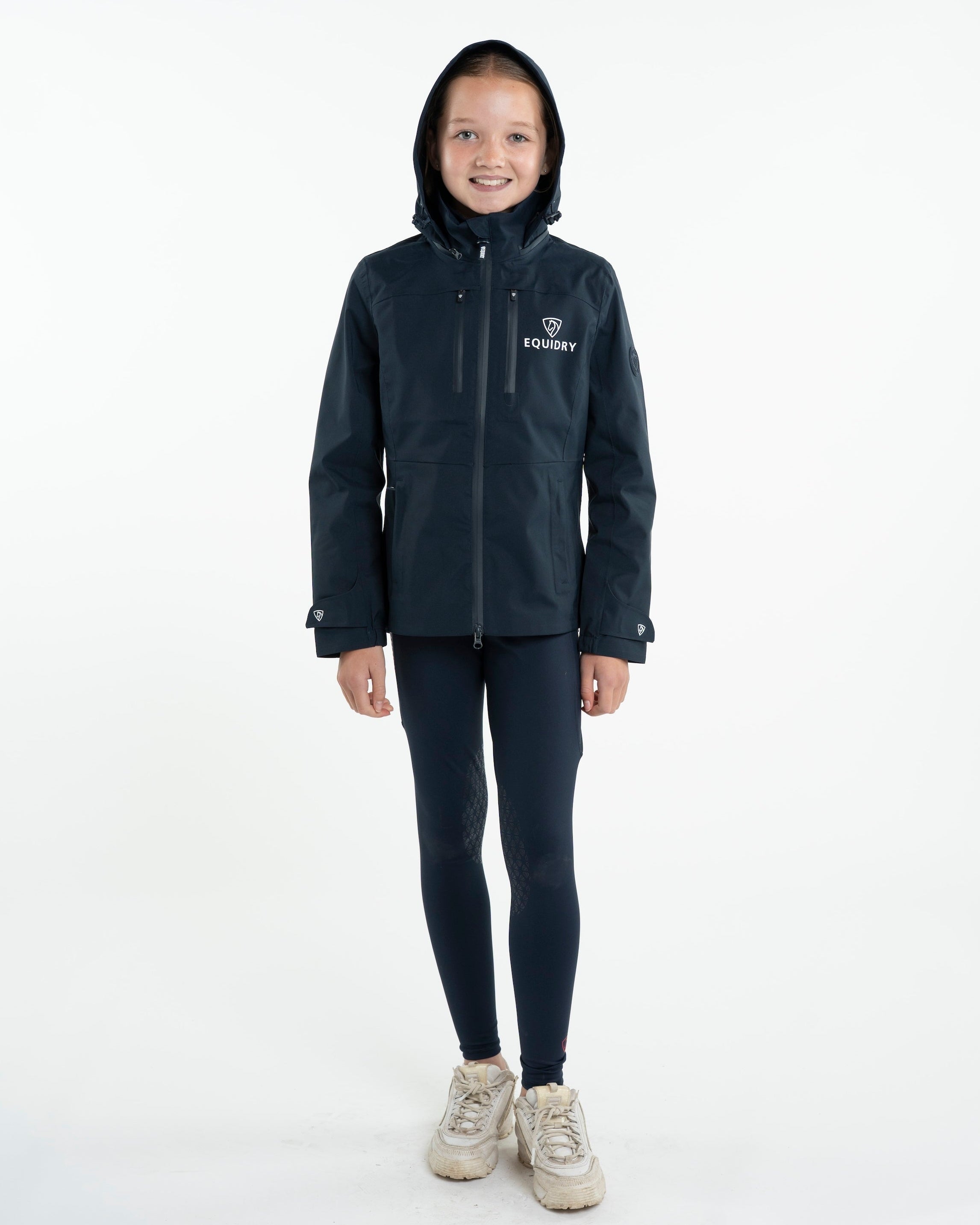 Girl's EQUIDRY Varsha Waterproof Riding Jacket - Navy. Equiflair Equestrian Apparel.