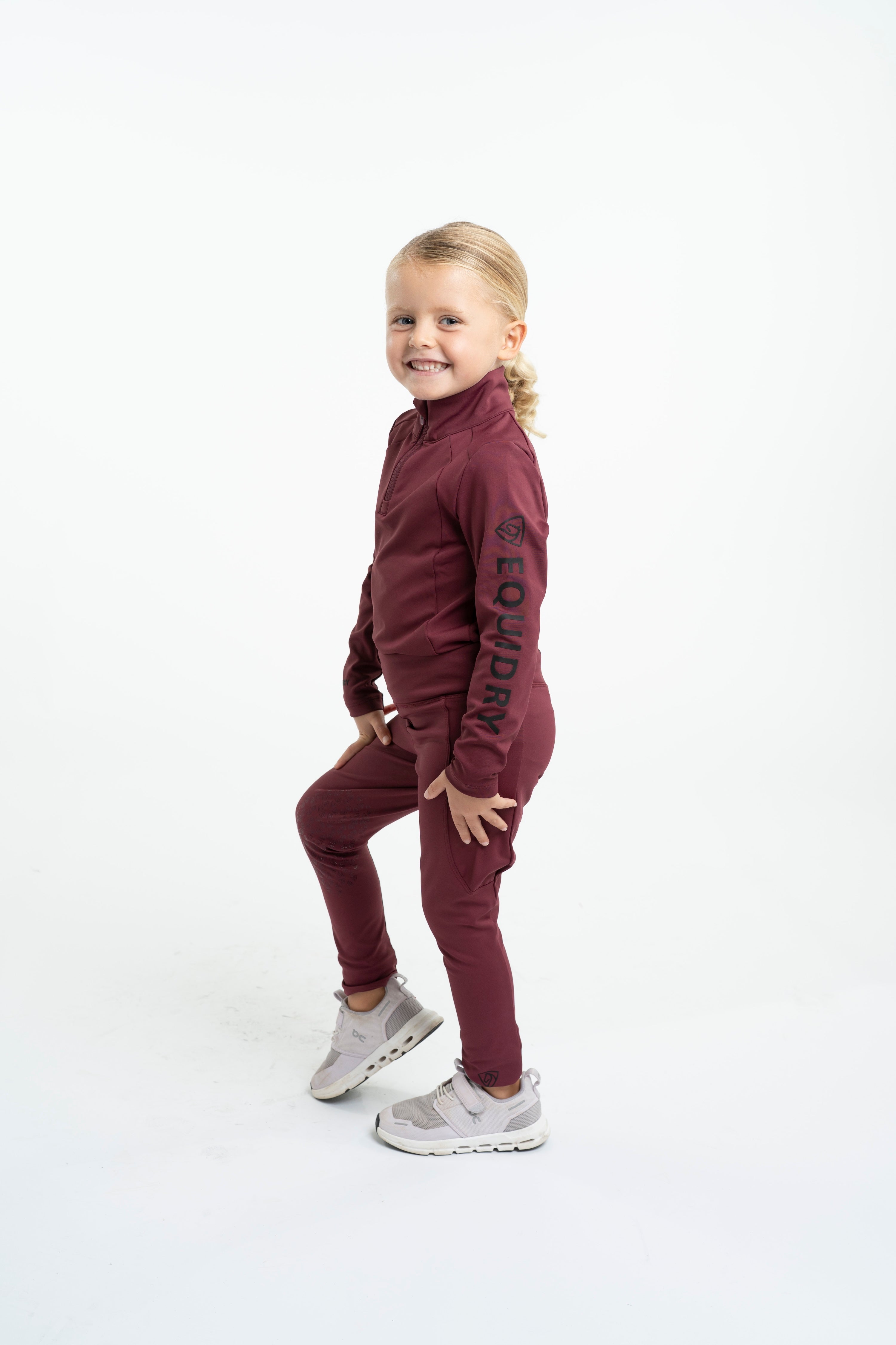 EQUIDRY Water Repellent Children's Riding Leggings - Plum/Black. Comfortable, durable equestrian apparel for kids.