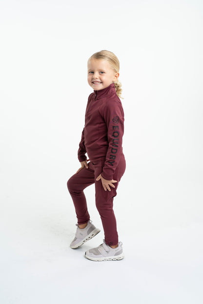 EQUIDRY Water Repellent Children's Riding Leggings - Plum/Black. Comfortable, durable equestrian apparel for kids.