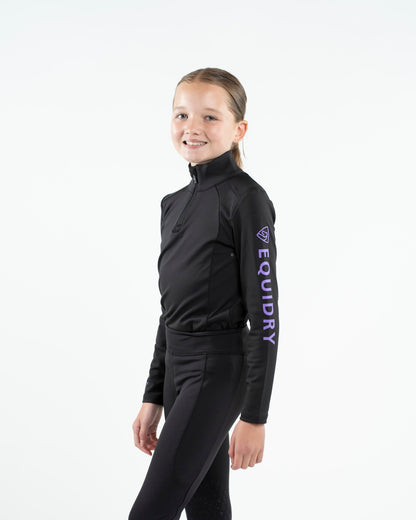 Child Equestrian Base Layer: Black Water Repellent Riding Top with Lilac Logo - EquiDry children's apparel, perfect for young riders.