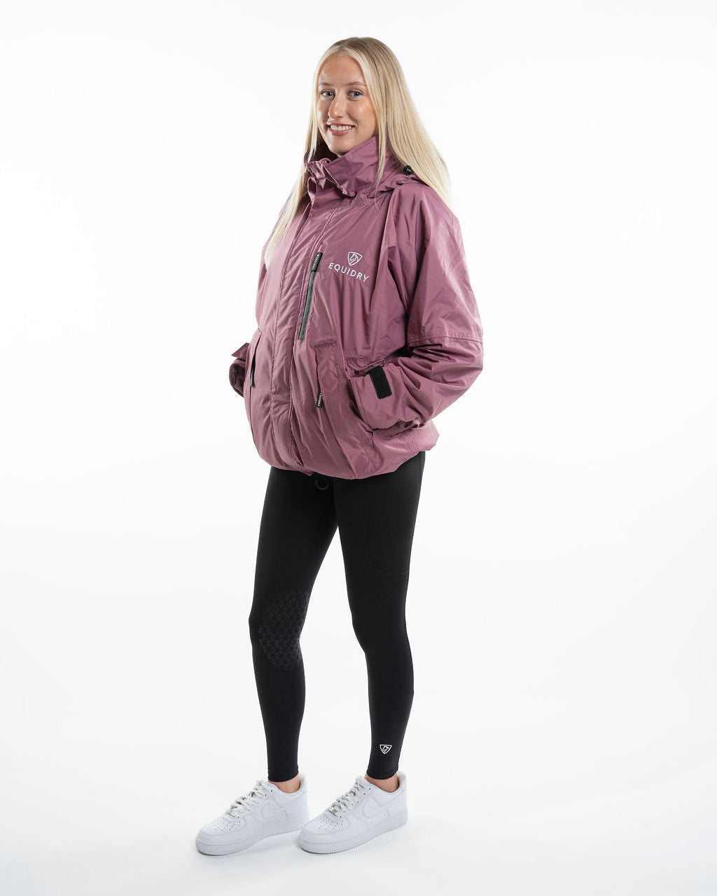 Woman in EQUIDRY Shortie Jacket Valerian: Waterproof & Fleece-Lined Outerwear for Women