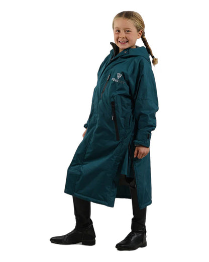 EQUIDRY Evolution Children's Waterproof Riding Coat - Teal Fleece Lined, Girl in Equestrian Outfit, Oversized Rain Jacket