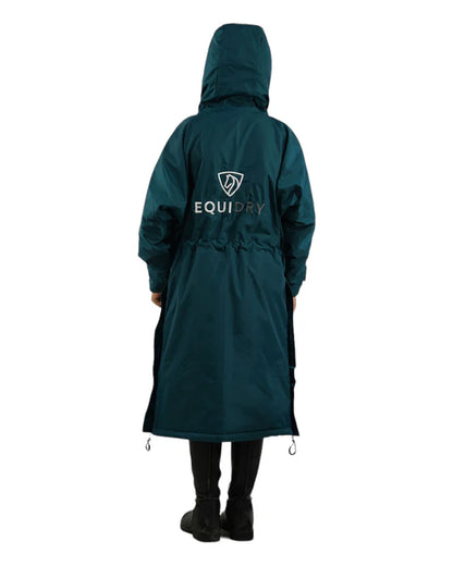 EQUIDRY Children's Teal Fleece Waterproof Coat. Kids' equestrian riding jacket. View from the back.