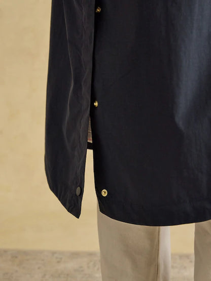 Joules Hensley Navy Waterproof Coat: Longline, Packable Hood, Recycled Nylon. Women's rain jacket.