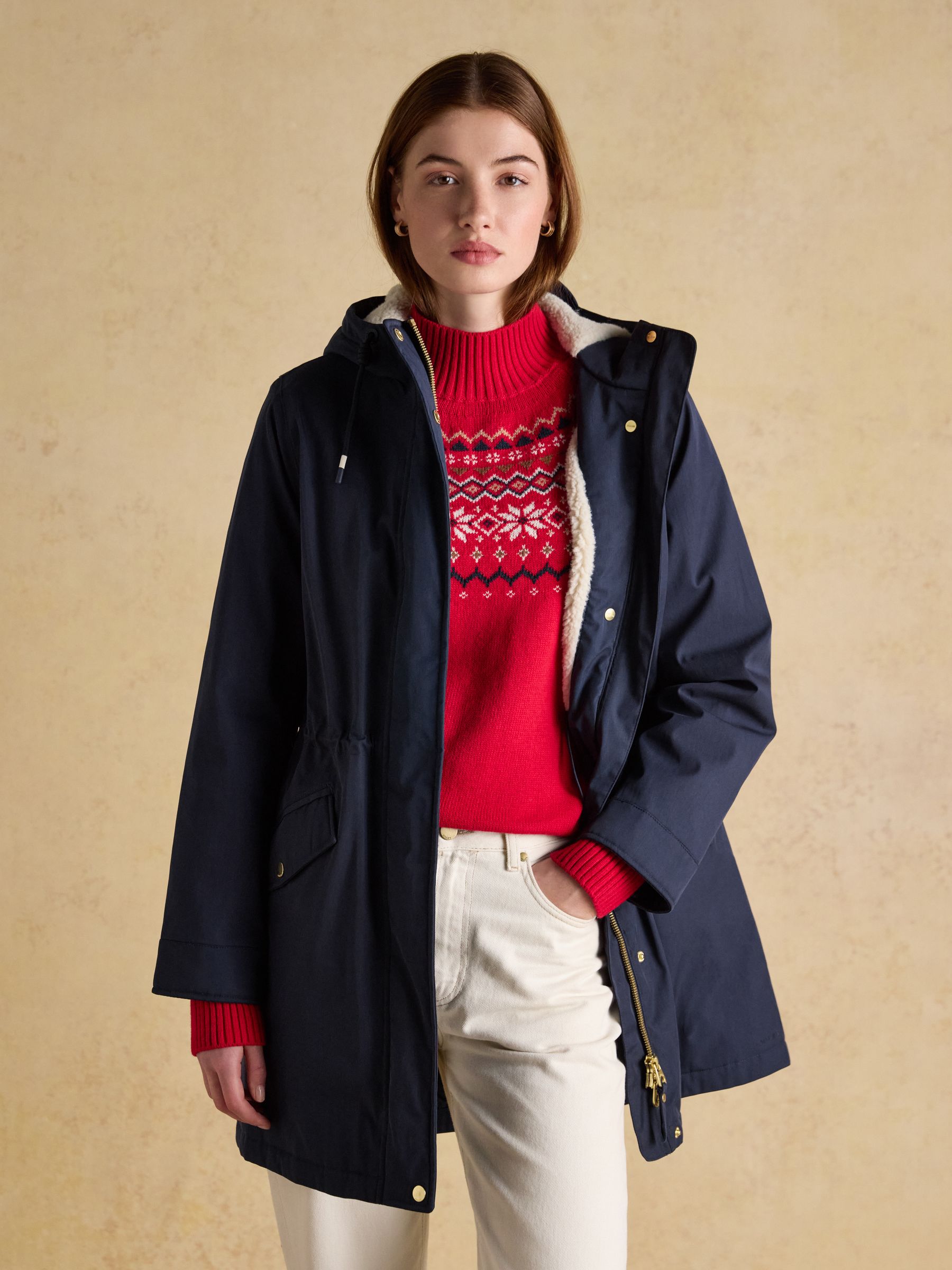 Joules navy fleece-lined waterproof raincoat with hood for women, stylish and warm winter outerwear.
