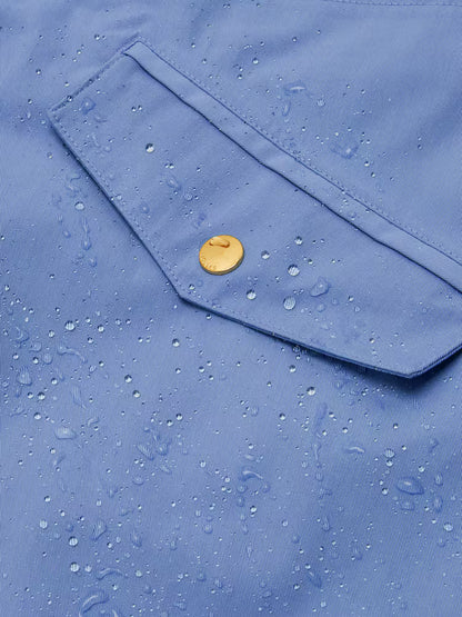 Joules Portwell blue hooded waterproof raincoat with water droplets on fabric