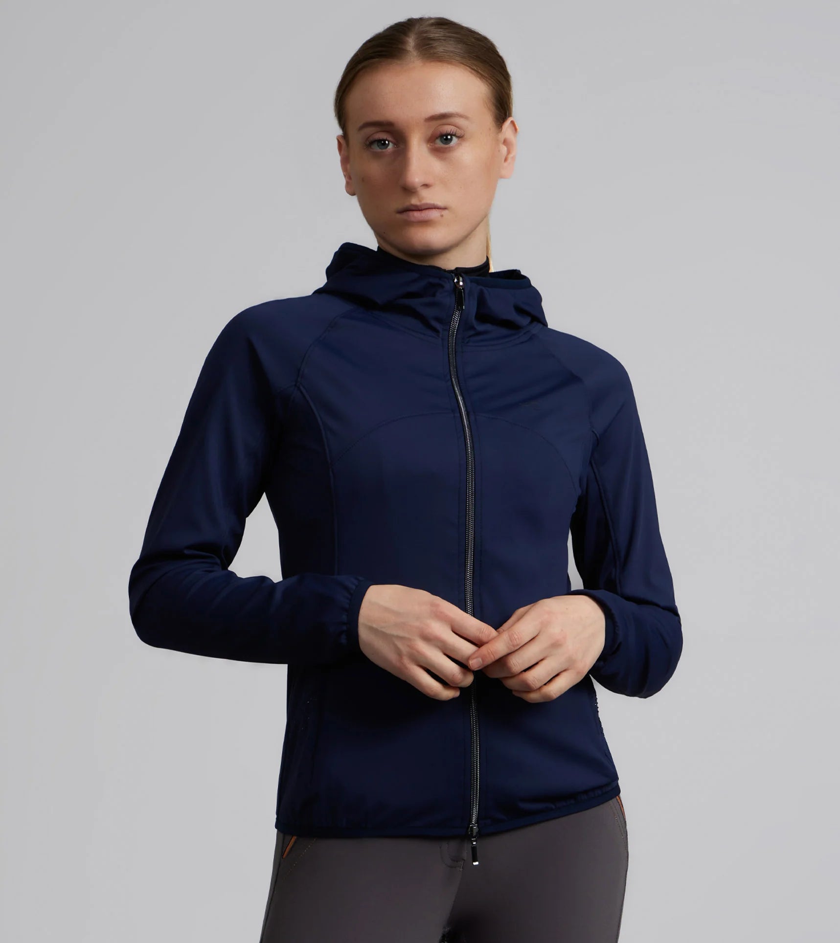 PREMIER EQUINE FRANCA LADIES SPORTS JACKET NAVY: Equestrian performance jacket with hood, breathable, lightweight, and stylish.