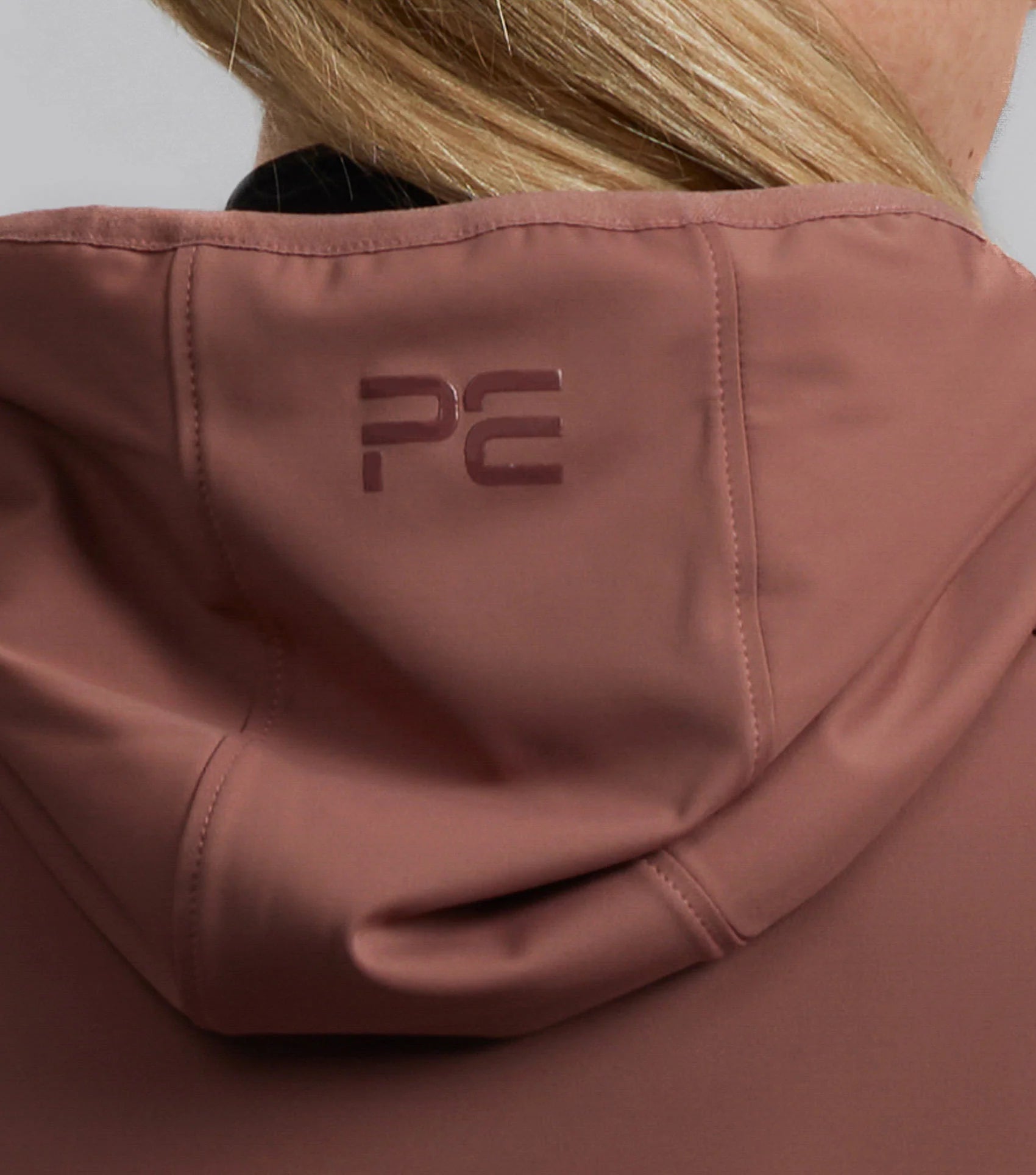 PREMIER EQUINE Franca Ladies Sports Jacket Rosewood from Equiflair: Equestrian riding jacket with hood. Stylish & functional.