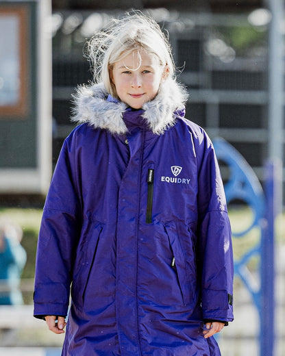 Equidry Evolution Children's Purple Waterproof Fleece Coat. Girl wearing jacket.