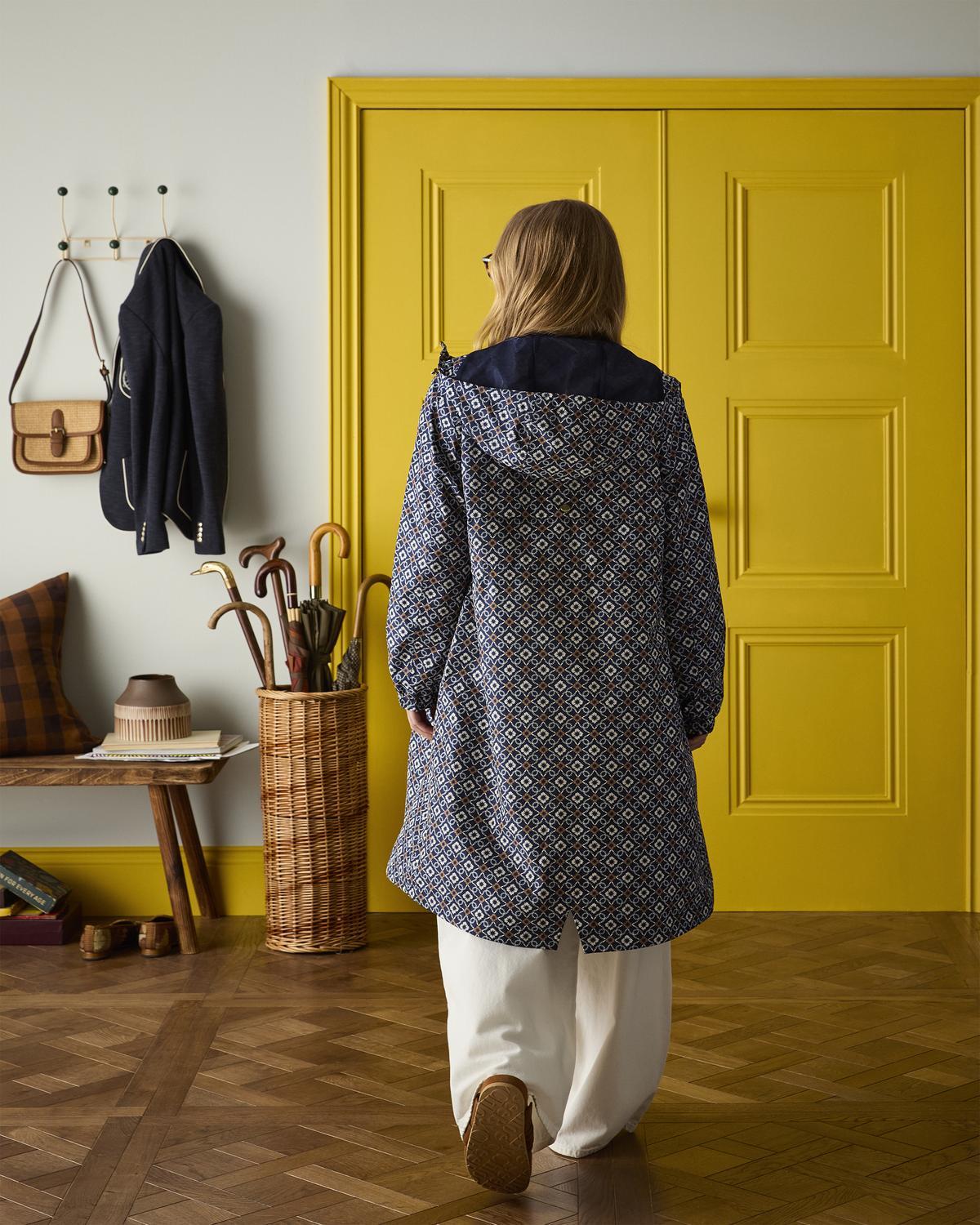 Joules Holkham Navy Packable Waterproof Raincoat. Women's patterned waterproof coat by Equiflair.