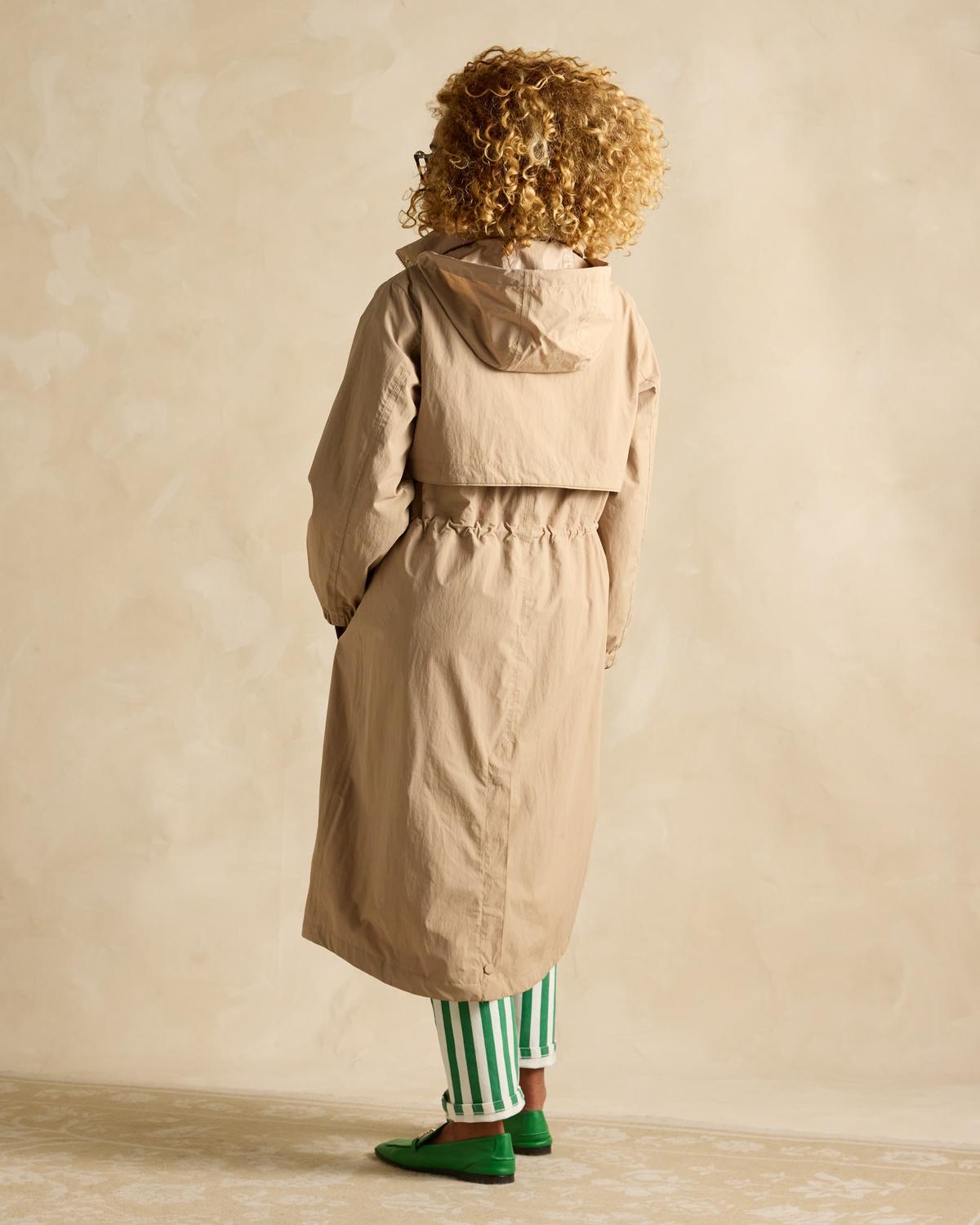 Joules Hensley Waterproof Coat - Tan Brown: Longline hooded jacket made of recycled nylon, perfect for rainy days from Equiflair.