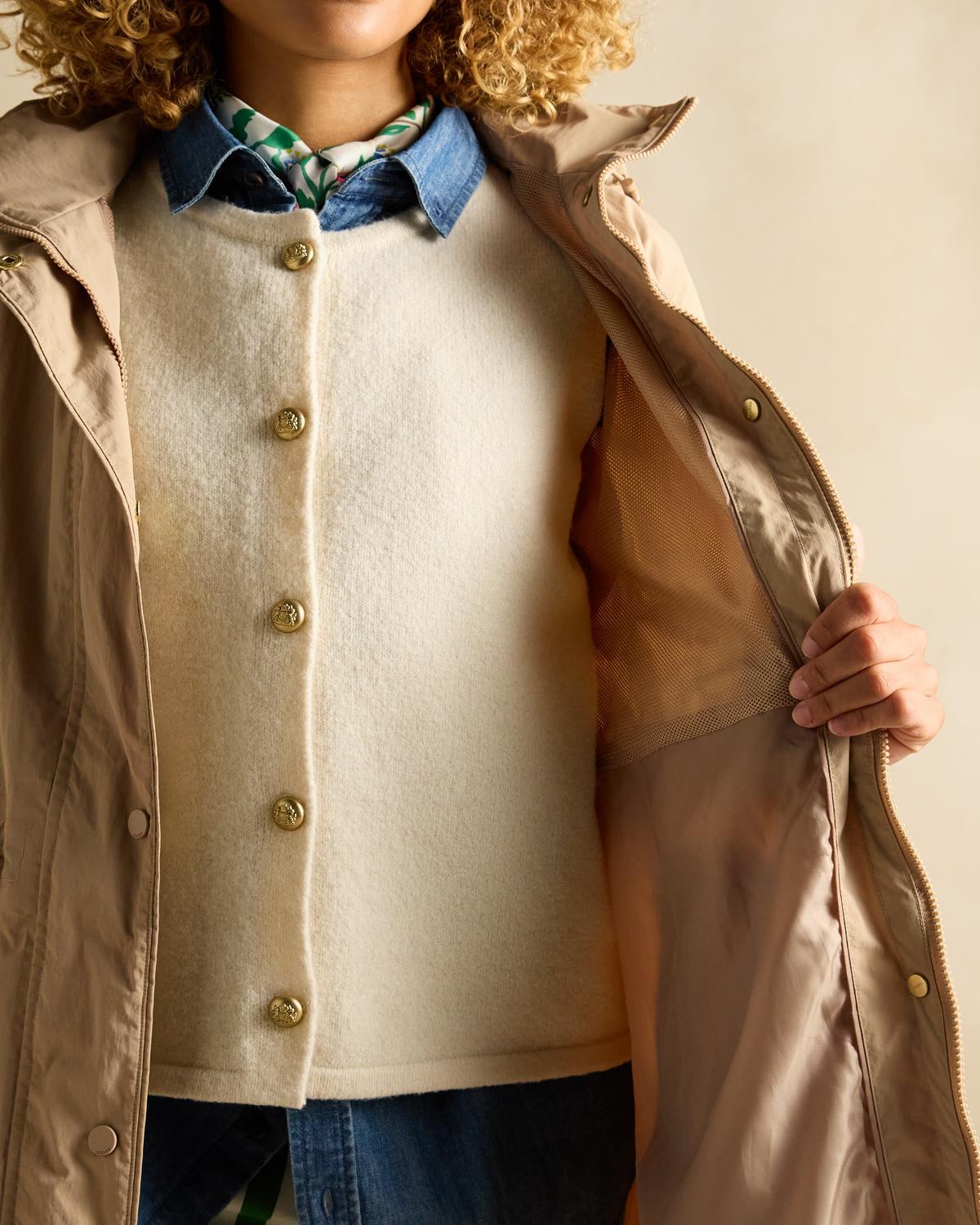 Joules Hensley Waterproof Coat - Tan Brown: Longline, Packable Hood, and Weather Ready! Shop Now at Equiflair.