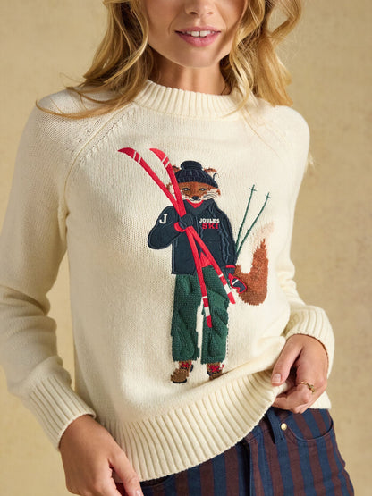 Women's Joules cream knit jumper with embroidered skiing fox graphic.