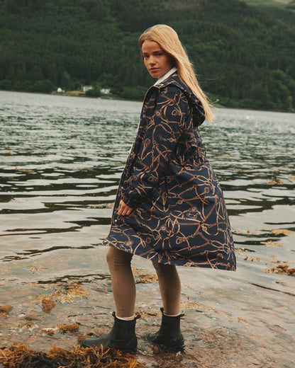 JOULES Holkham Navy Waterproof Packable Raincoat - Equiflair: Stylish and functional women's outerwear by the water.