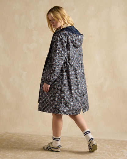 JOULES Holkham Navy Waterproof Packable Raincoat Women's. Geometric pattern coat. Packable, waterproof jacket.