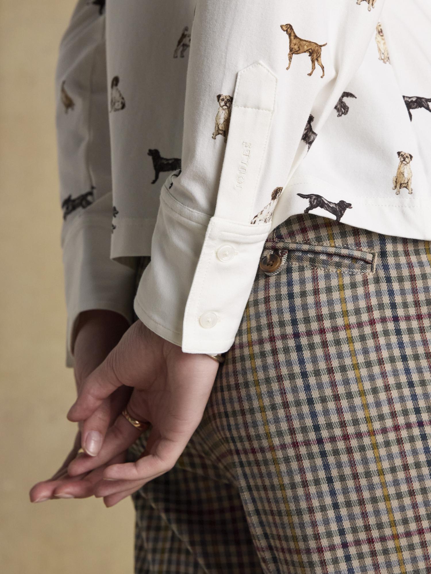 JOULES X Eleanor Tomlinson dog print shirt by Equiflair. Woman's cream jersey top with dog motifs and buttoned cuffs.