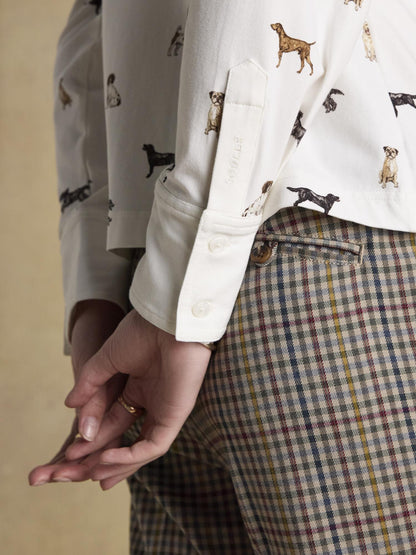 JOULES X Eleanor Tomlinson dog print shirt by Equiflair. Woman's cream jersey top with dog motifs and buttoned cuffs.