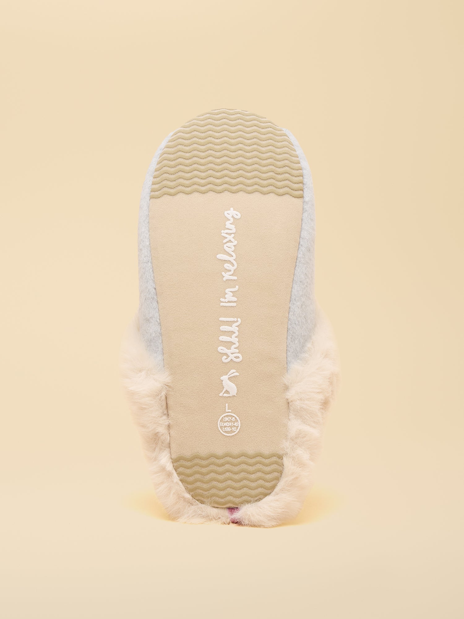 Joules Grey Dog Slippers: Cozy faux fur-lined slippers with a textured sole. Perfect for relaxing at home!