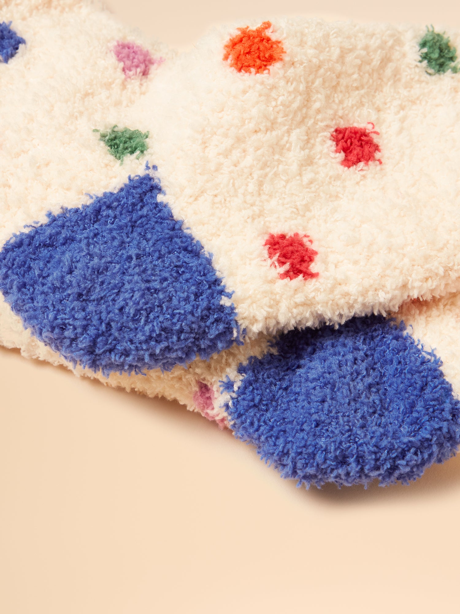 Joules Creme Spot Fluffy Socks: Warm, Comfortable & Stylish Socks with Colorful Spots & Blue Heel Toe. Shop Joules Socks at Equiflair!