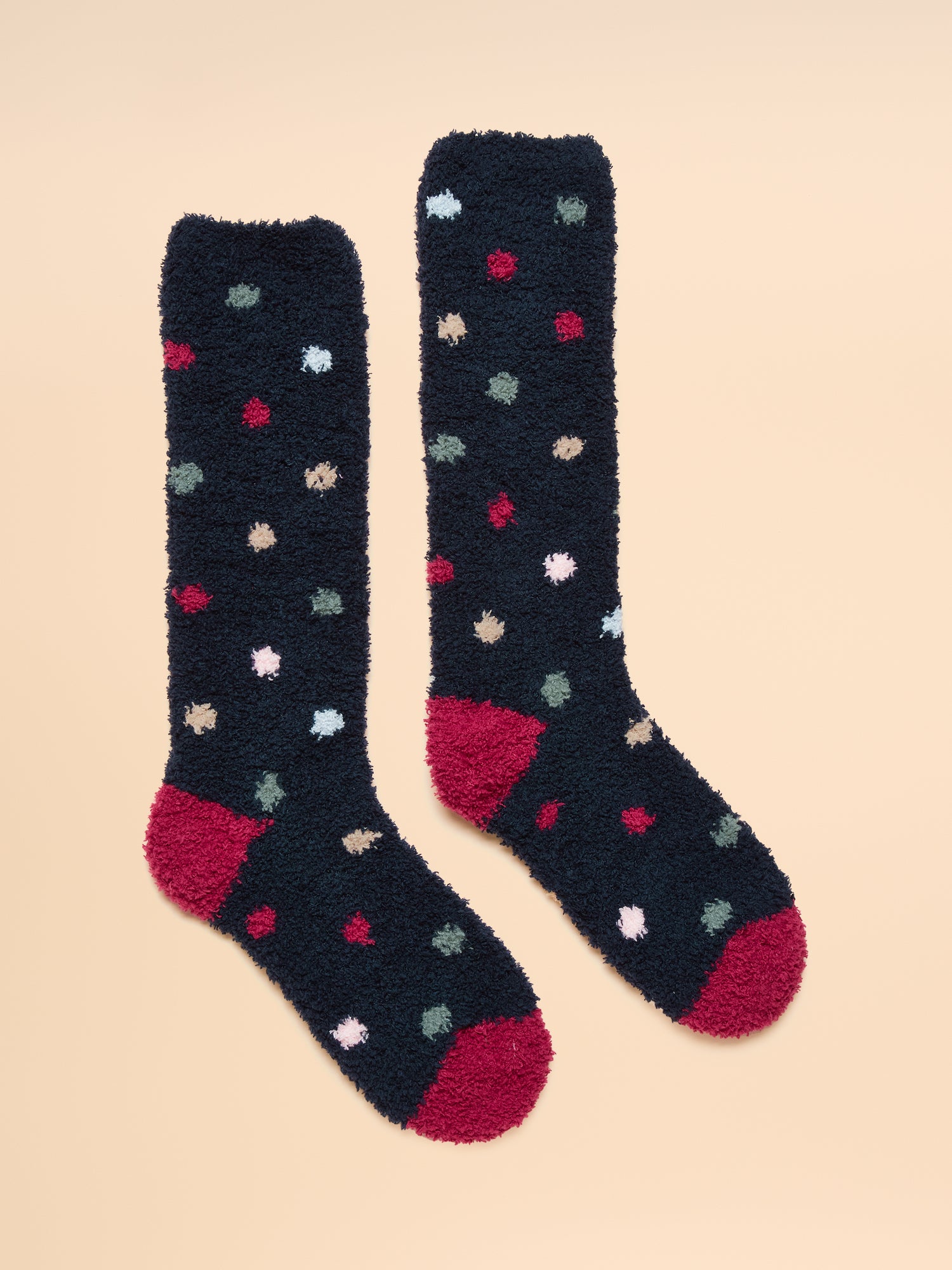 Joules Navy Spot Fluffy Socks: Cozy winter socks with red heel & toe detail, polka dot pattern. Soft and warm for ultimate comfort.