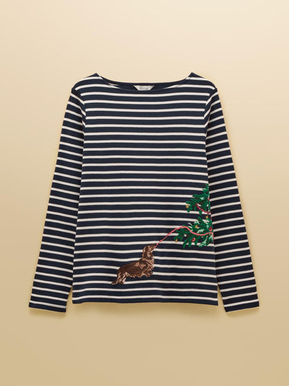 Joules Festive Harbour Dog Navy/Cream Breton Top. Long sleeve boat neck shirt with dog pulling a Christmas tree. Equiflair store