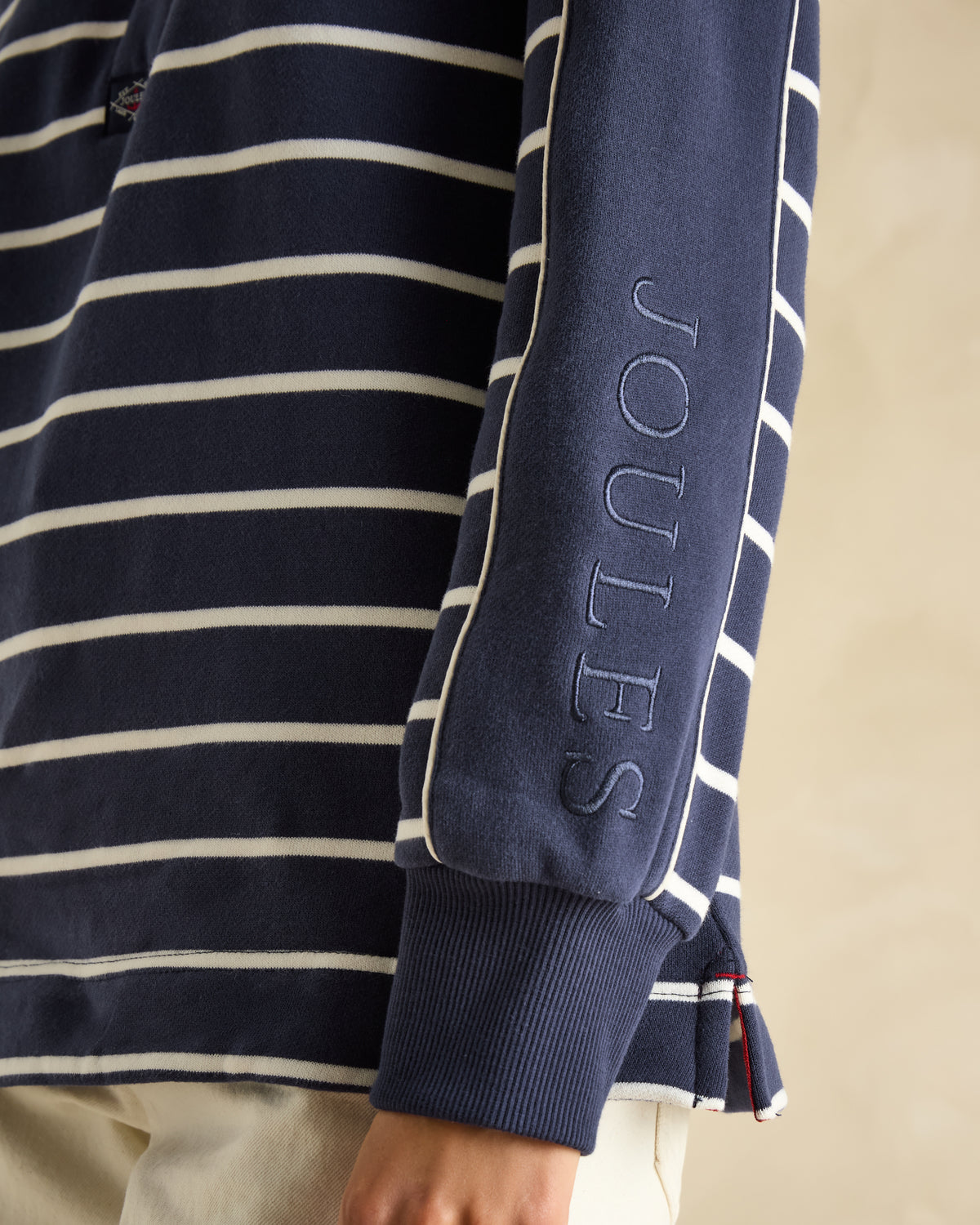 Joules Southwold Navy Striped Sweatshirt: Button-down funnel neck, coastal style. Equiflair.