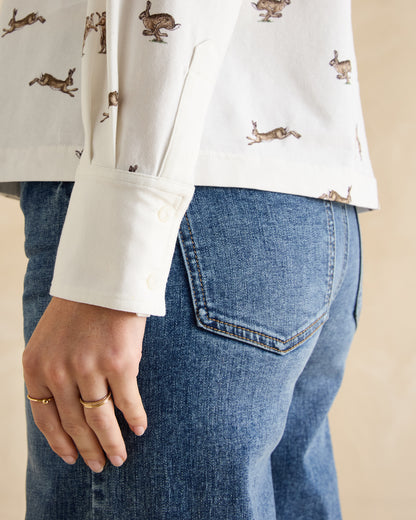 Joules Eleanor Tomlinson Cream Hare Print Jersey Shirt, Long Sleeves, Button Down with Blue Jeans. Equestrian Fashion