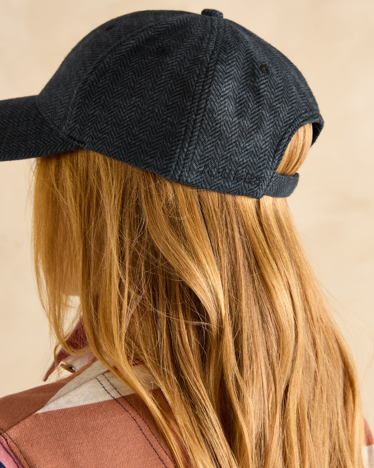 JOULES DALEY Herringbone Cap Navy: Stylish women's baseball cap with a textured fabric and adjustable fit. Equiflair