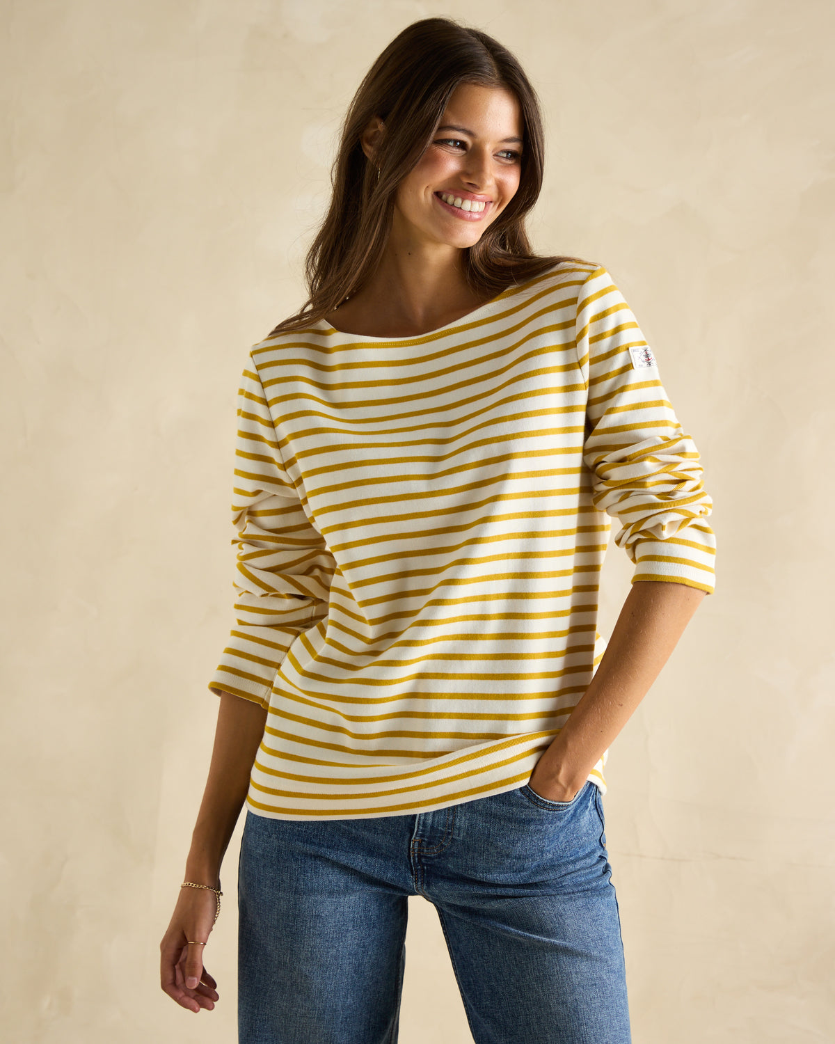 Joules Harbour Top Mustard Yellow: Woman wearing striped Breton shirt. Relaxed fit, long sleeves.