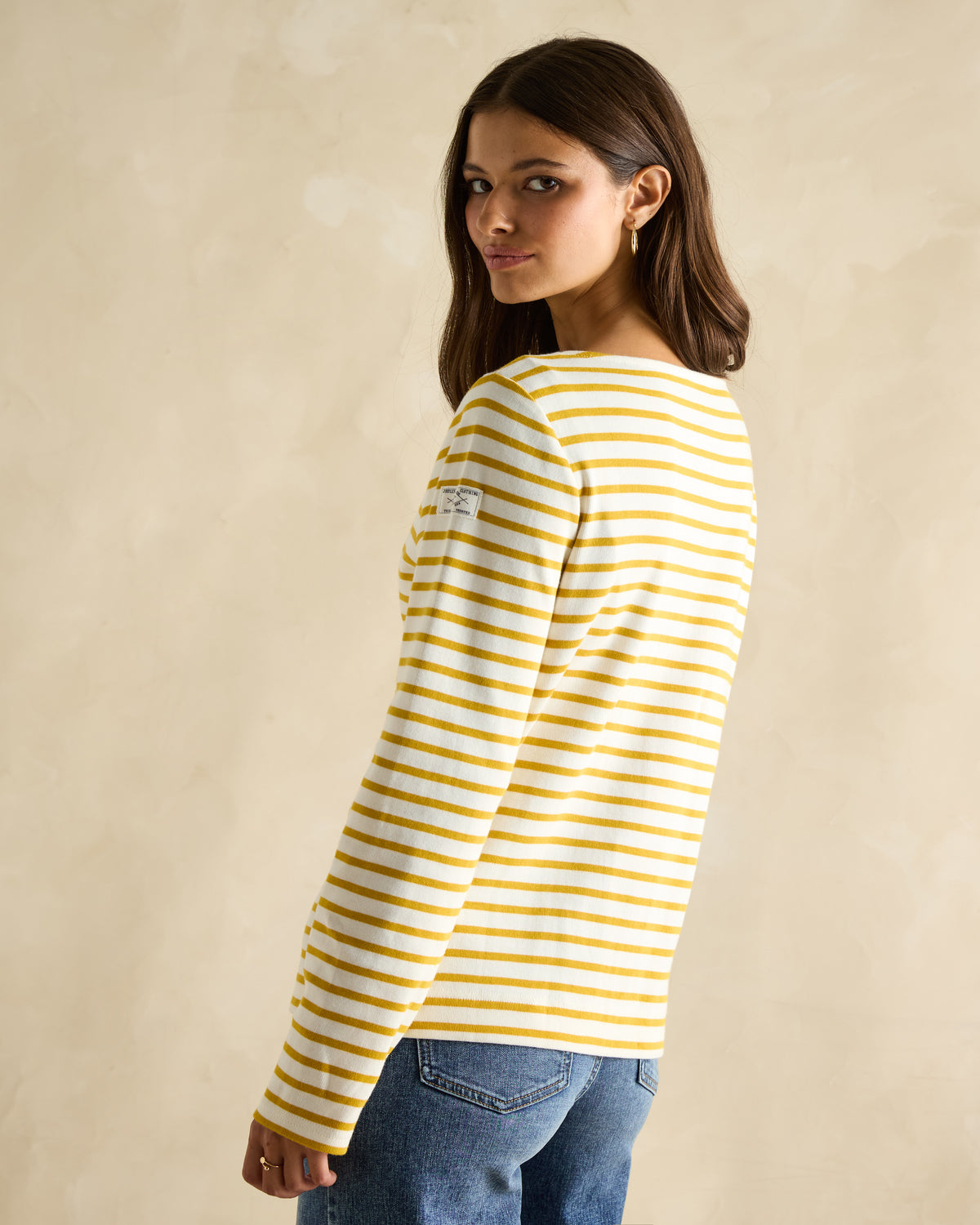 JOULES Harbour Top Mustard Yellow: Woman in striped shirt by Equiflair.