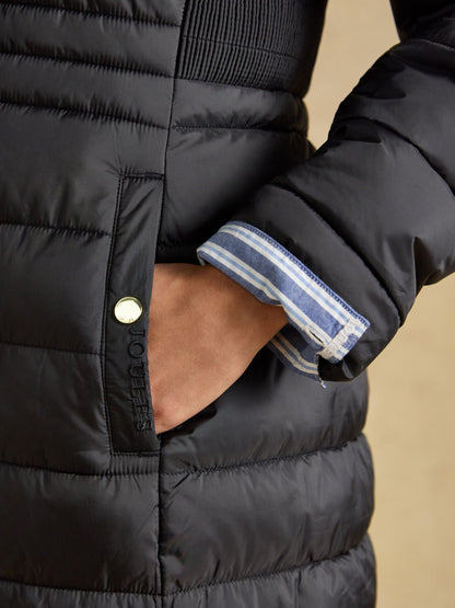 Joules women's black longline padded coat with showerproof finish, pocket detail and striped cuff.