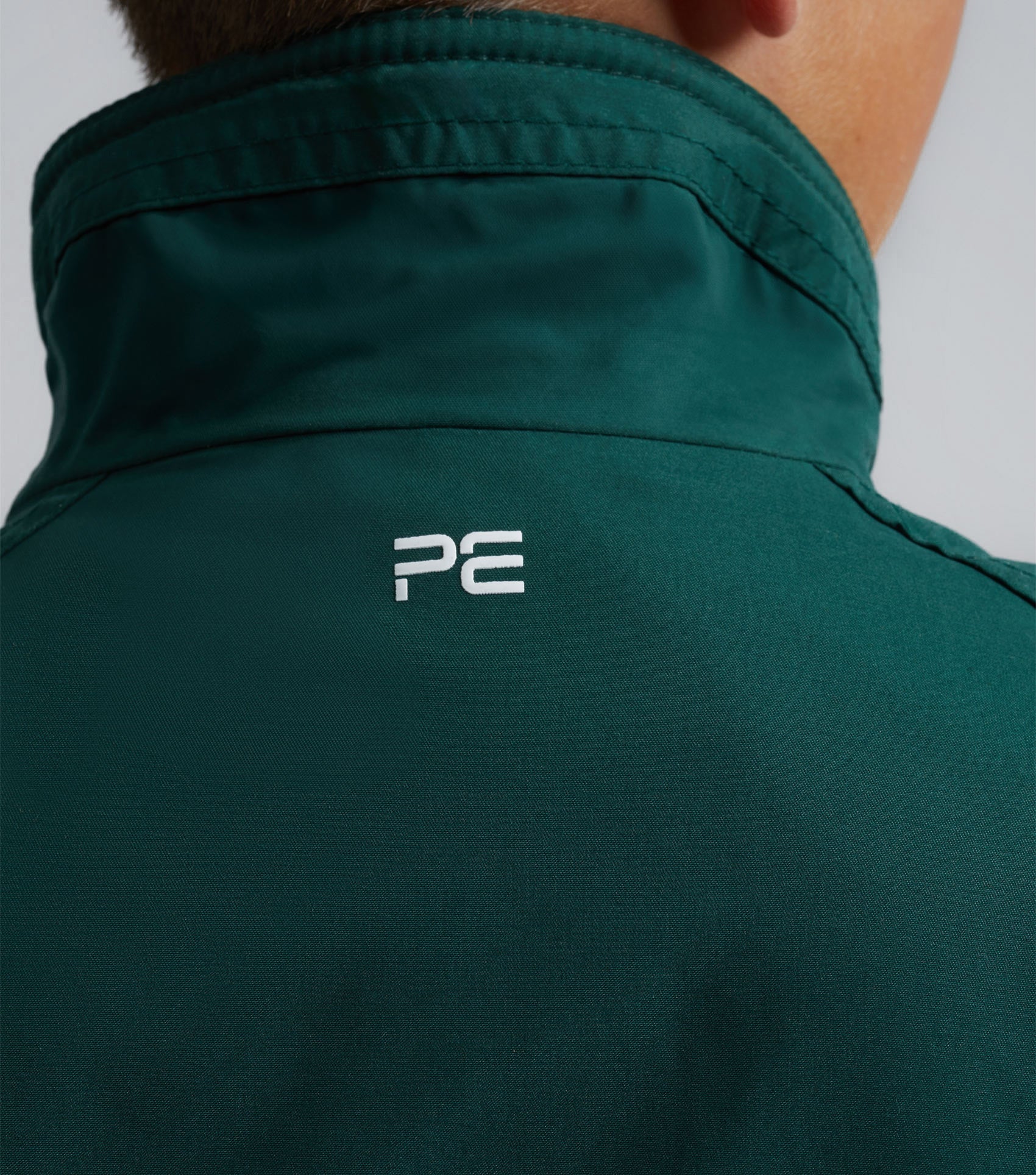 Premier Equine Junior Pro Rider Green Riding Jacket: Waterproof, Comfortable, & Stylish Equestrian Apparel